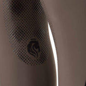Closeup view of the Dark Brown Equinavia Maud Tech Knee Patch Breeches showing the silicone grip Equinavia logo