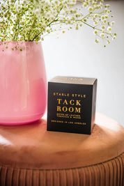 Front view of the packaging for the Tack Room Stable Style Soy Wax Candle