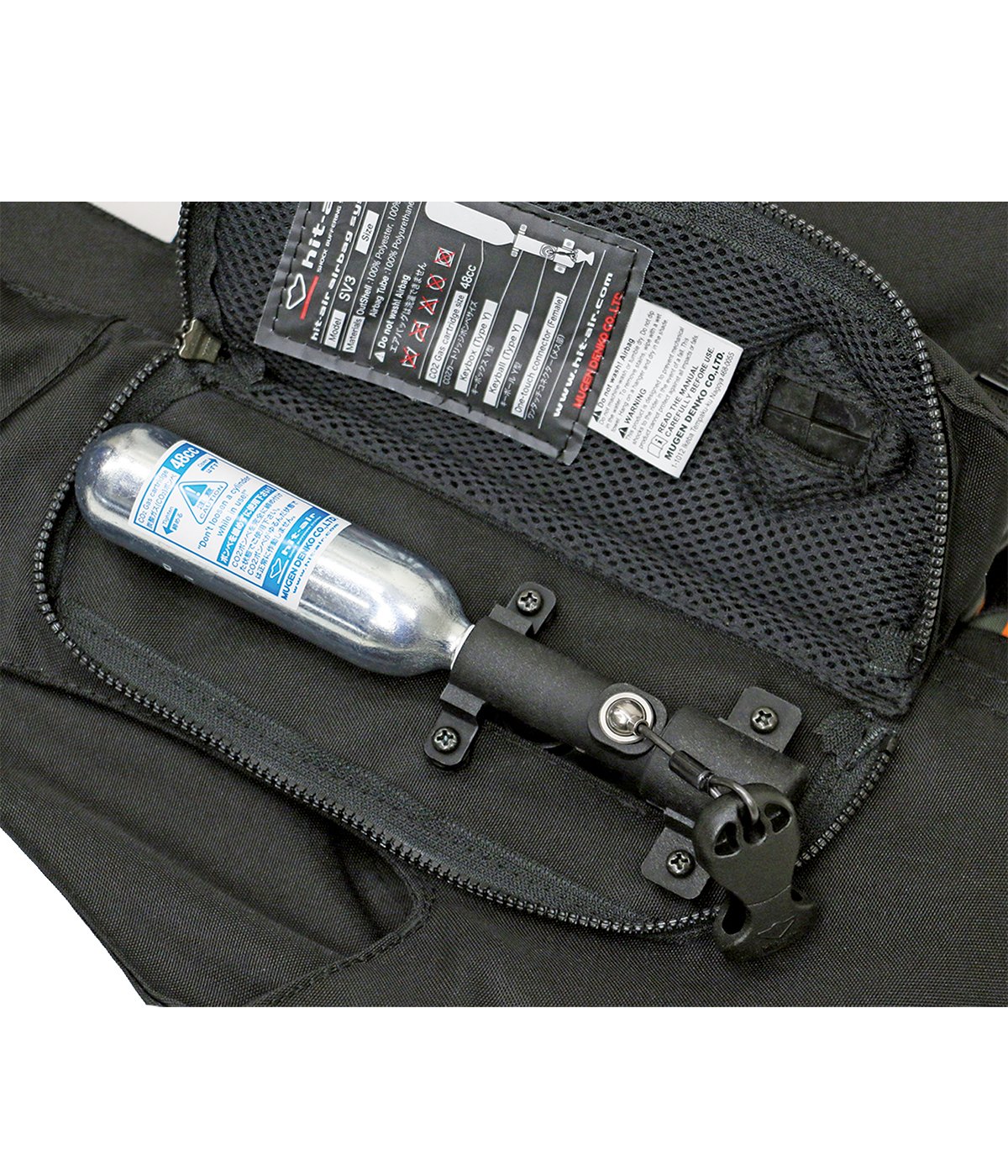 Close-up view of the cartridge on the Black Hit Air SV3 Airbag Vest on a white background