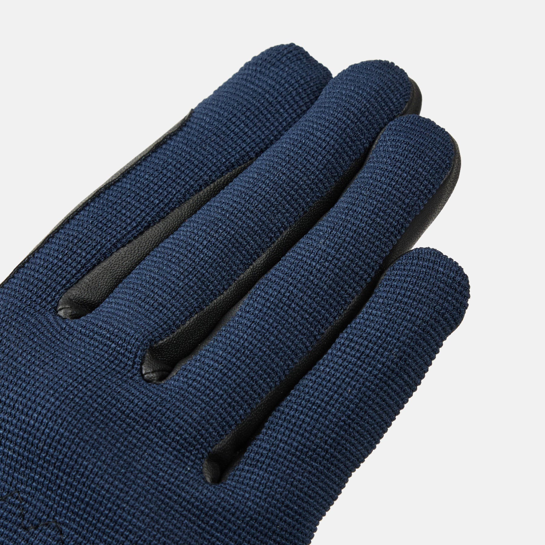 Back view of the fingers on a Seaborne Navy Horze Romy Winter Riding Glove on a plain background