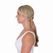 Side view of a female model wearing the Platinum Ellsworth Ponytail Hairnet on a white background