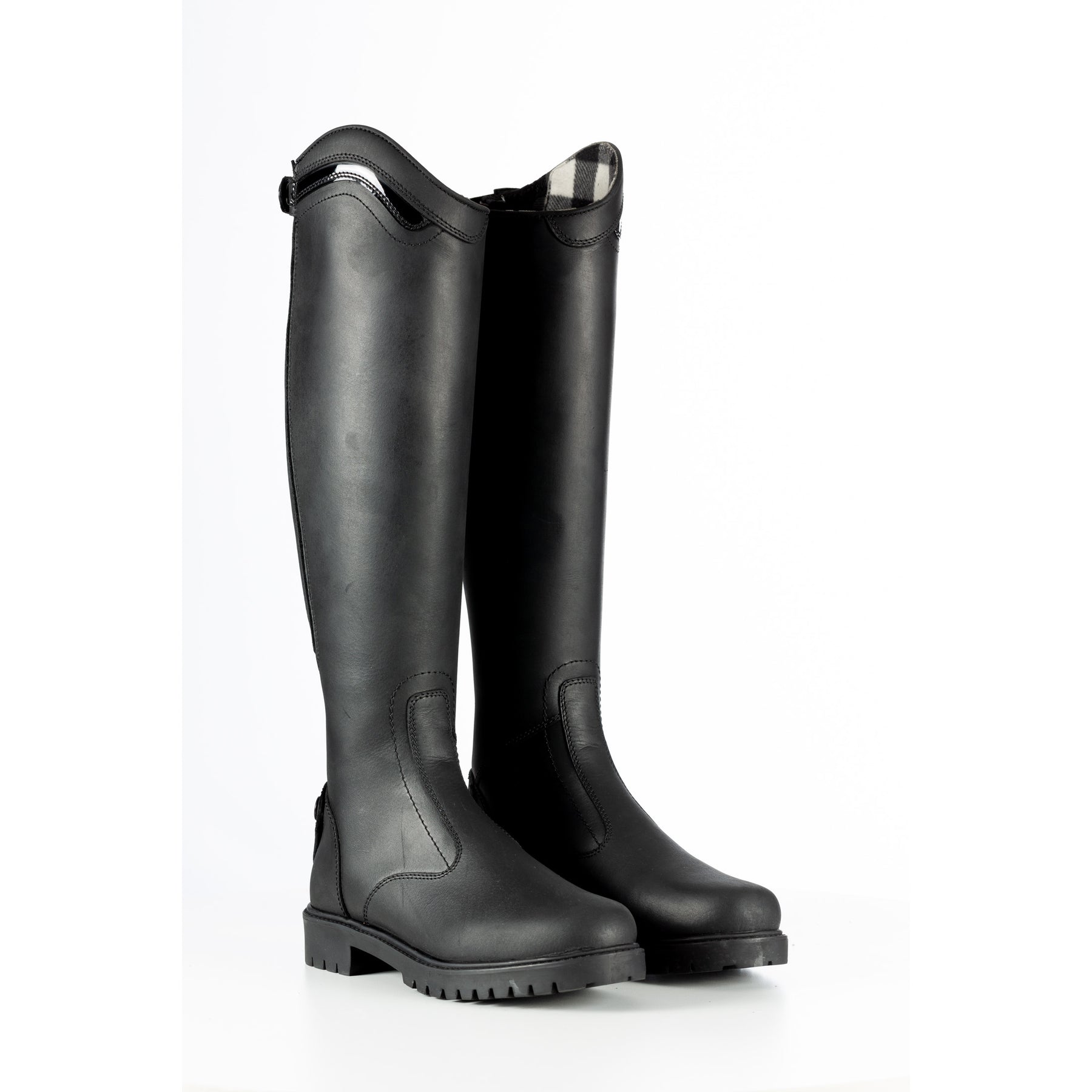 Angled front view of a pair of Black Equinavia Josefine Winter Tall Riding Boots on a white background