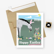 Front view of the Happy Easter Hunt Seat Paper Co. Greeting Card with its envelope