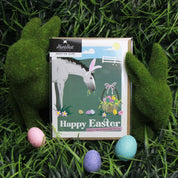 Front view of the Happy Easter Hunt Seat Paper Co. Greeting Card in its packaging
