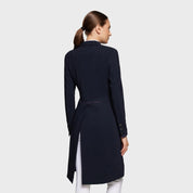 Back view of a female model wearing the Navy Samshield Alcantara Long Frac on a plain background