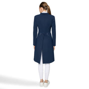 Full body back view of a female model wearing the Cosmic Blue Samshield Premium Frac with white breecheson a plain background