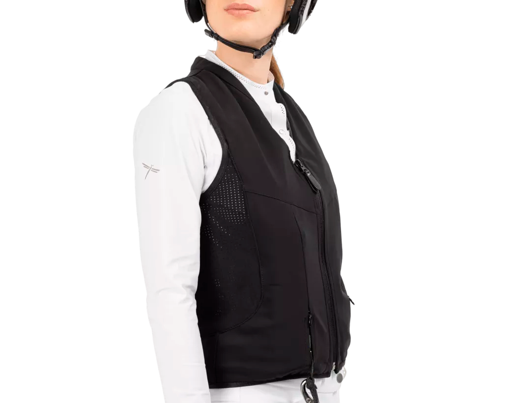 Angled front view of a female model wearing the Freejump Airbag on a white background