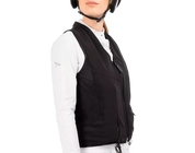 Angled front view of a female model wearing the Freejump Airbag on a white background