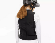 Back view of a female model wearing the Freejump Airbag on a white background