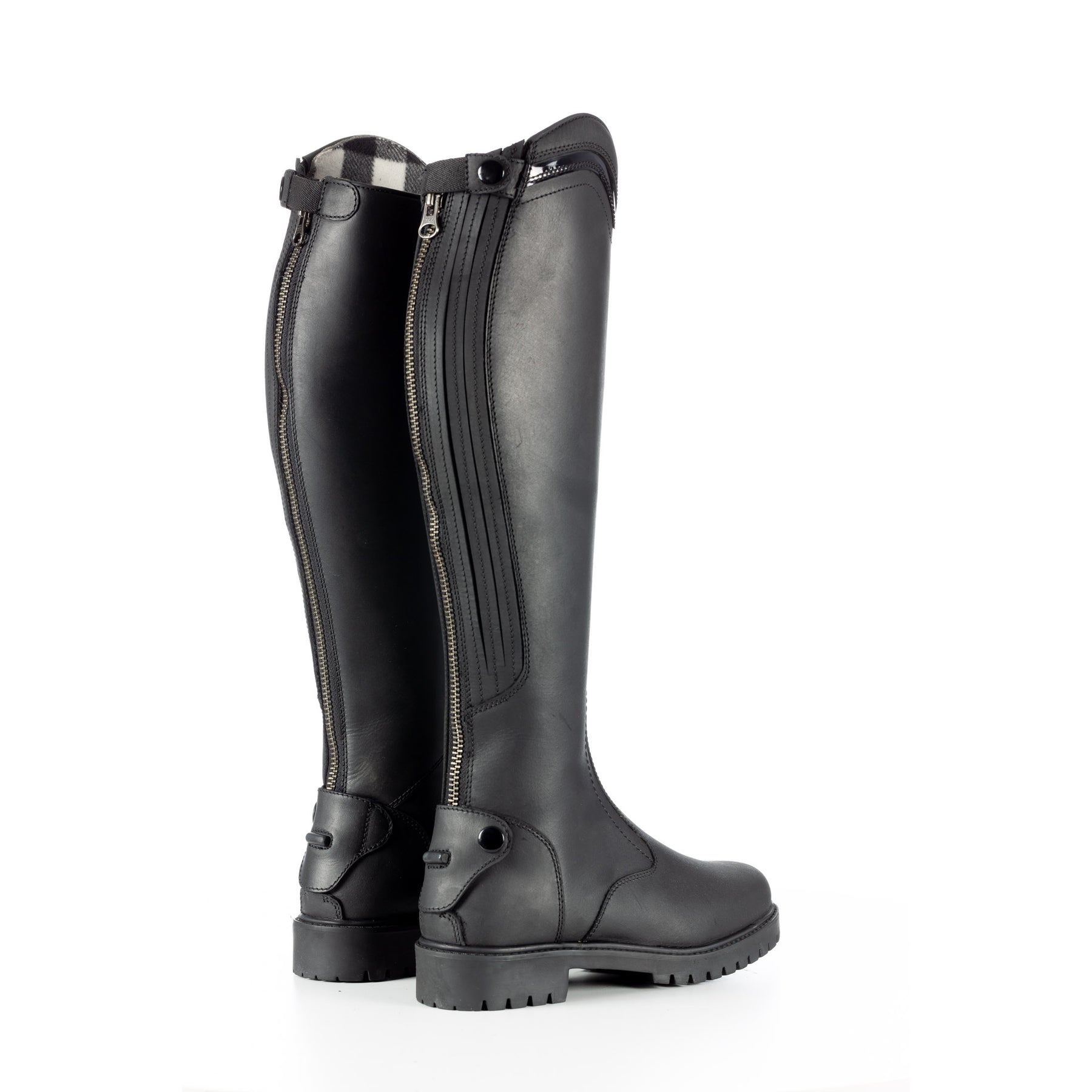 Angled back view of a pair of Black Equinavia Josefine Winter Tall Riding Boots on a white background