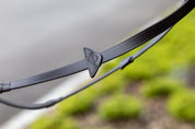 Close-up view of the LeMieux name on the stopper of the Brown/Brass LeMieux Rubber Reins