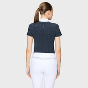 Back view of a female model wearing the Anthracite Drop Samshield Gretta Short Sleeve Show Shirt on a plain background