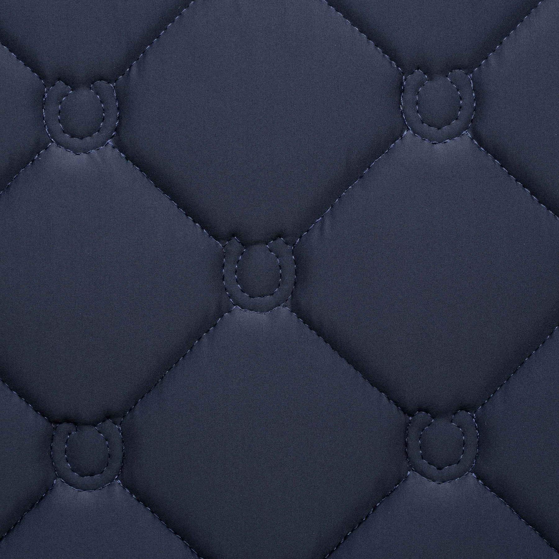 View of the quilting pattern on the Navy Equinavia Bergen Crystal Dressage Saddle Pad