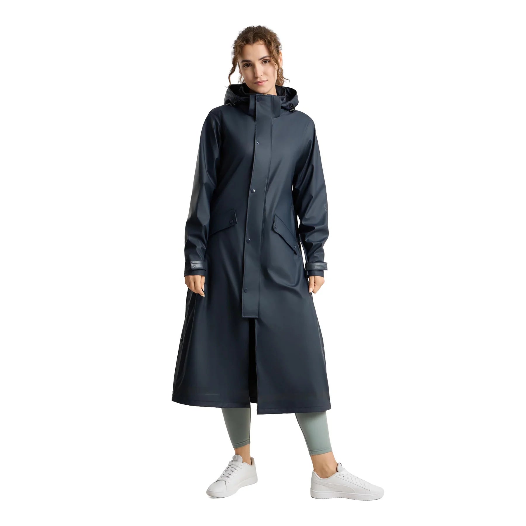 Front view of a model wearing the Navy Horze Hazel Womens Long Raincoat on a plain background