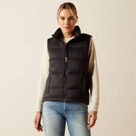 Black puffer vest with stitching shown on model