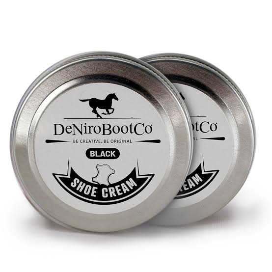 Small jar of boot cream with black and white label shown on white background