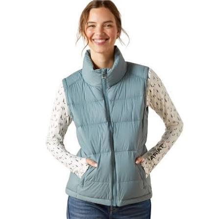 Light blue puffer vest with stitching shown on model