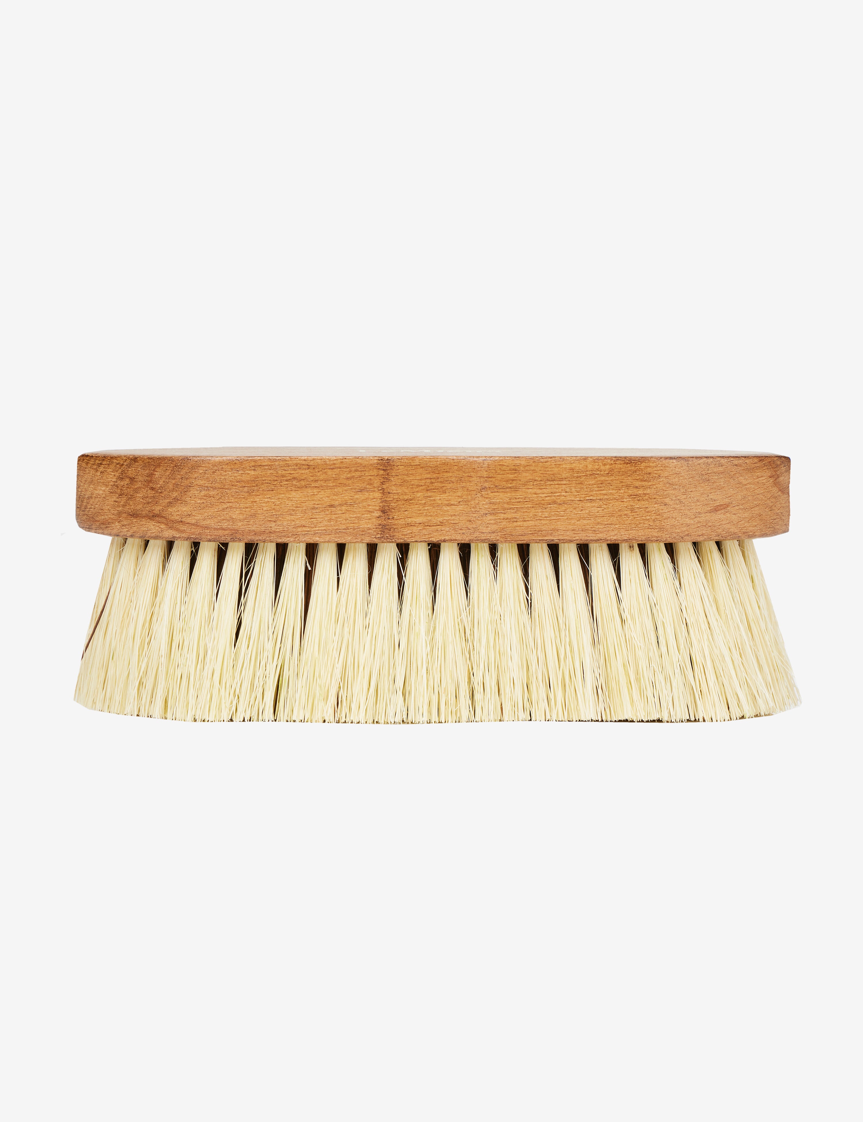 Side view of the LeMieux Artisan Deep Clean Dandy Brush on a plain background