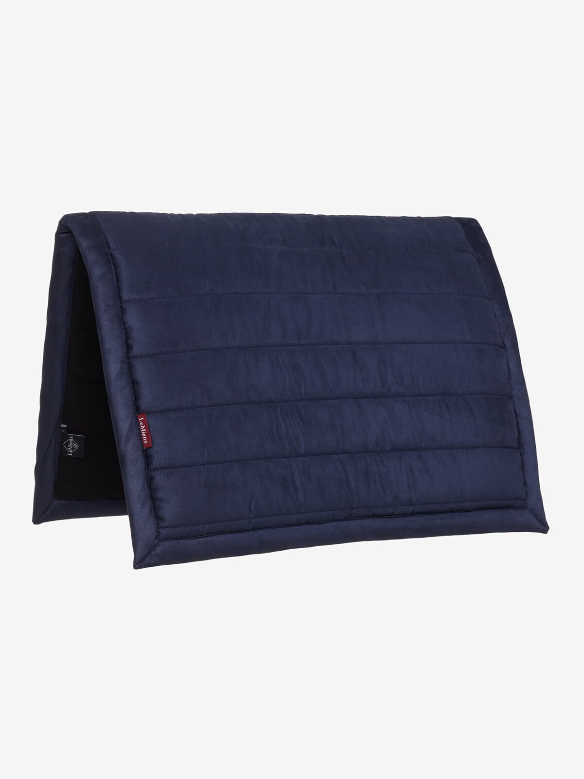 Side view of the Navy LeMieux Pillow Pad on a plain background