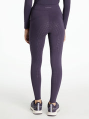 Back view of a model wearing the purple Lemieux Young Rider Orla Pull On Tight on a white background
