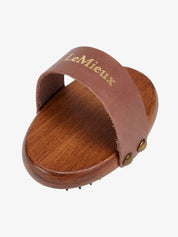 Top view of the Lemieux Artisan Massage Brush on a plain background
