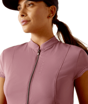 Close-up front view of a model wearing the tulipwood Ariat Breathe 1/2 Zip Short Sleeve Baselayer on a white background