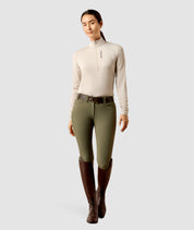 Full body front view of a female model wearing the Chateau Gray Ariat Lunaveil 1/2 Zip Baselayer on a plain background