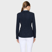 Back view of a female model wearing the Navy Samshield Lauren Show Coat on a plain background