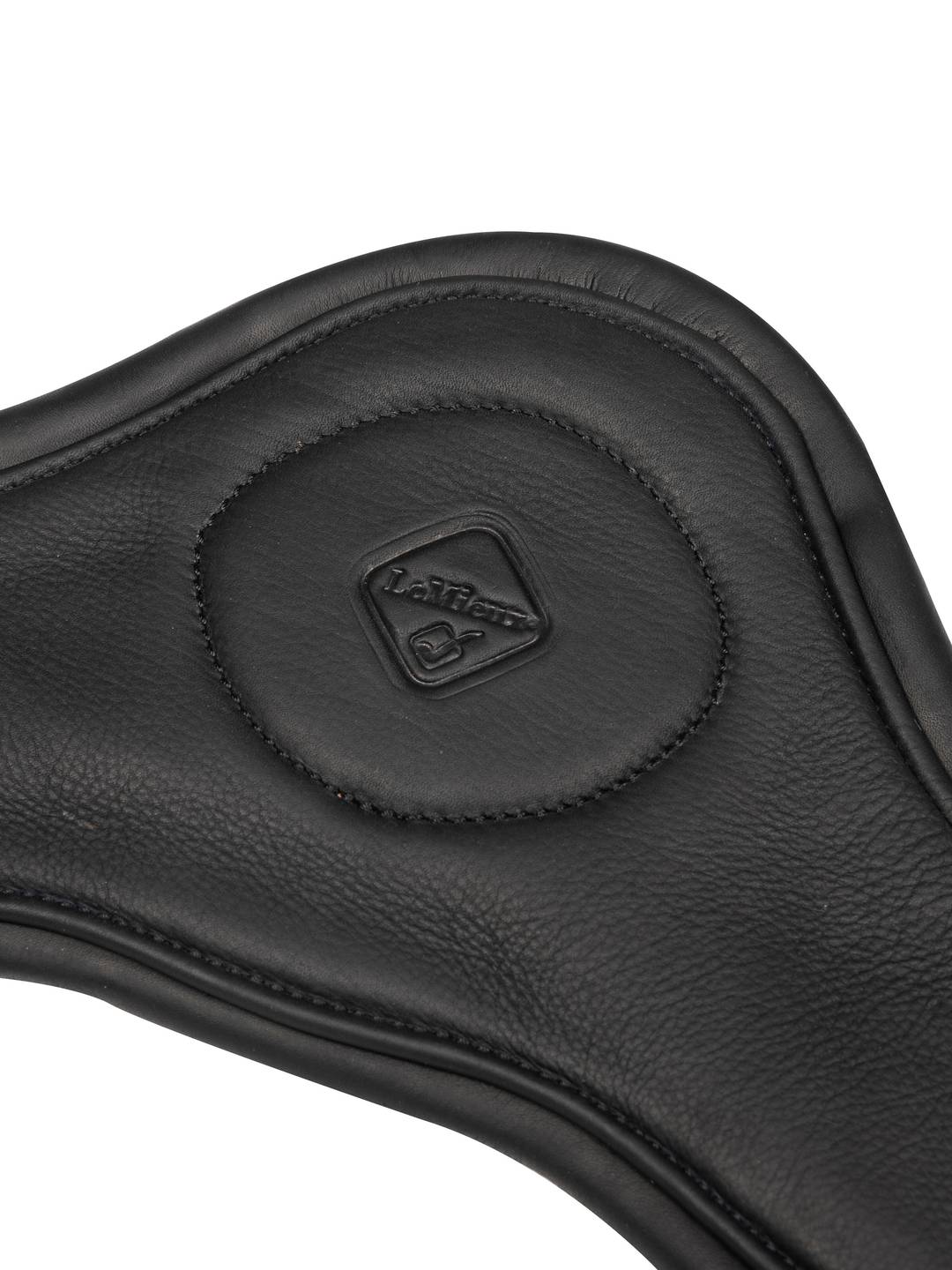 Close-up view of the LeMieux logo on the Black LeMieux Gel-Tek Anatomic Dressage Girth on a plain background