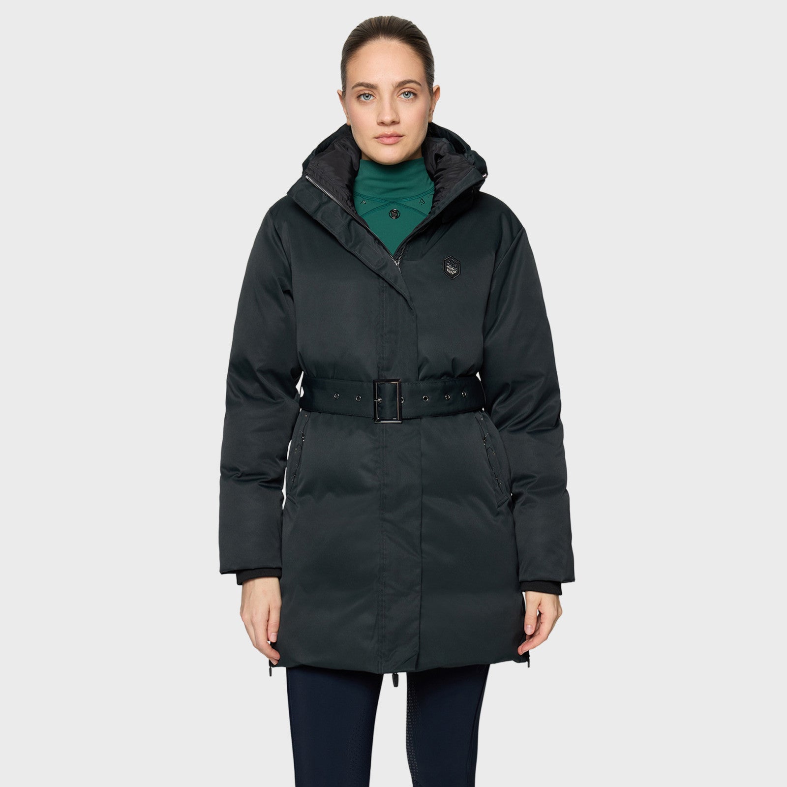 Front view of a female model wearing the Moonless Night Samshield Melyne Puffer Jacket on a plain background