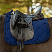 Close-up side view of a horse wearing the Navy Equinavia Bergen Crystal Dressage Saddle Pad