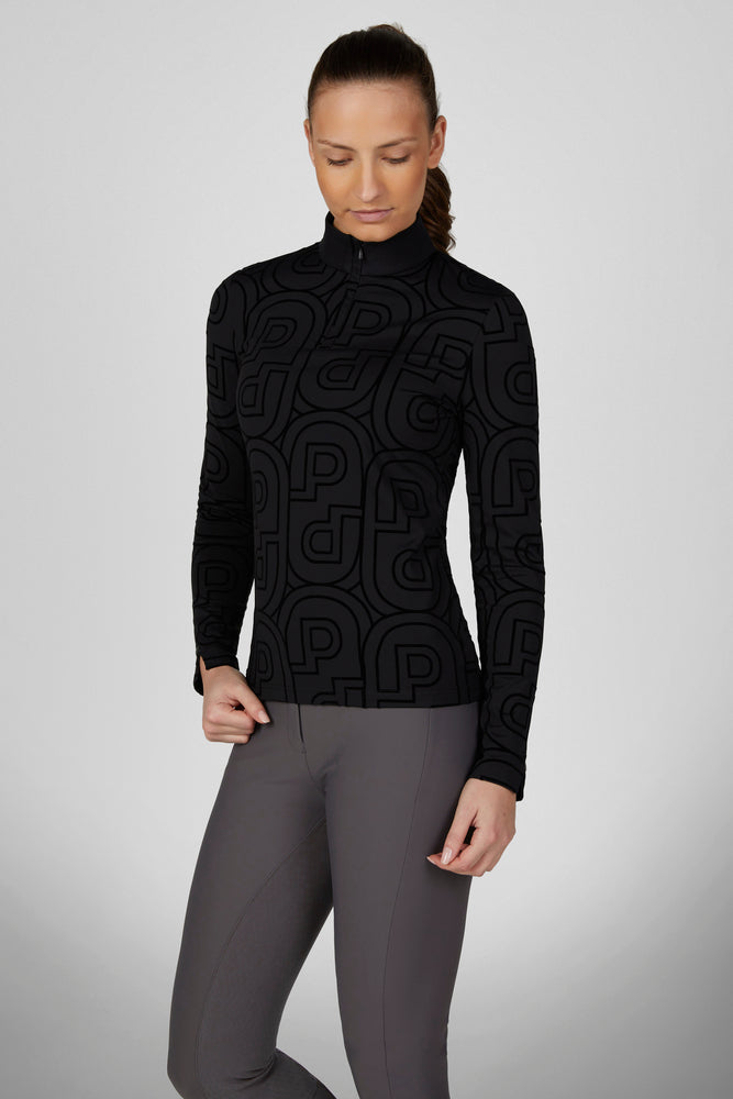 Front view of a female model wearing the Black Pikeur Zip Print Shirt on a plain background