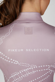 Close-up back view of a female model wearing the Ash Mauve Pikeur Zip Print Shirt