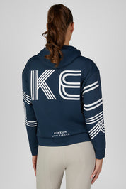 Back view of a female model wearing the Pine Green Pikeur Athleisure Zip Hoody on a plain background