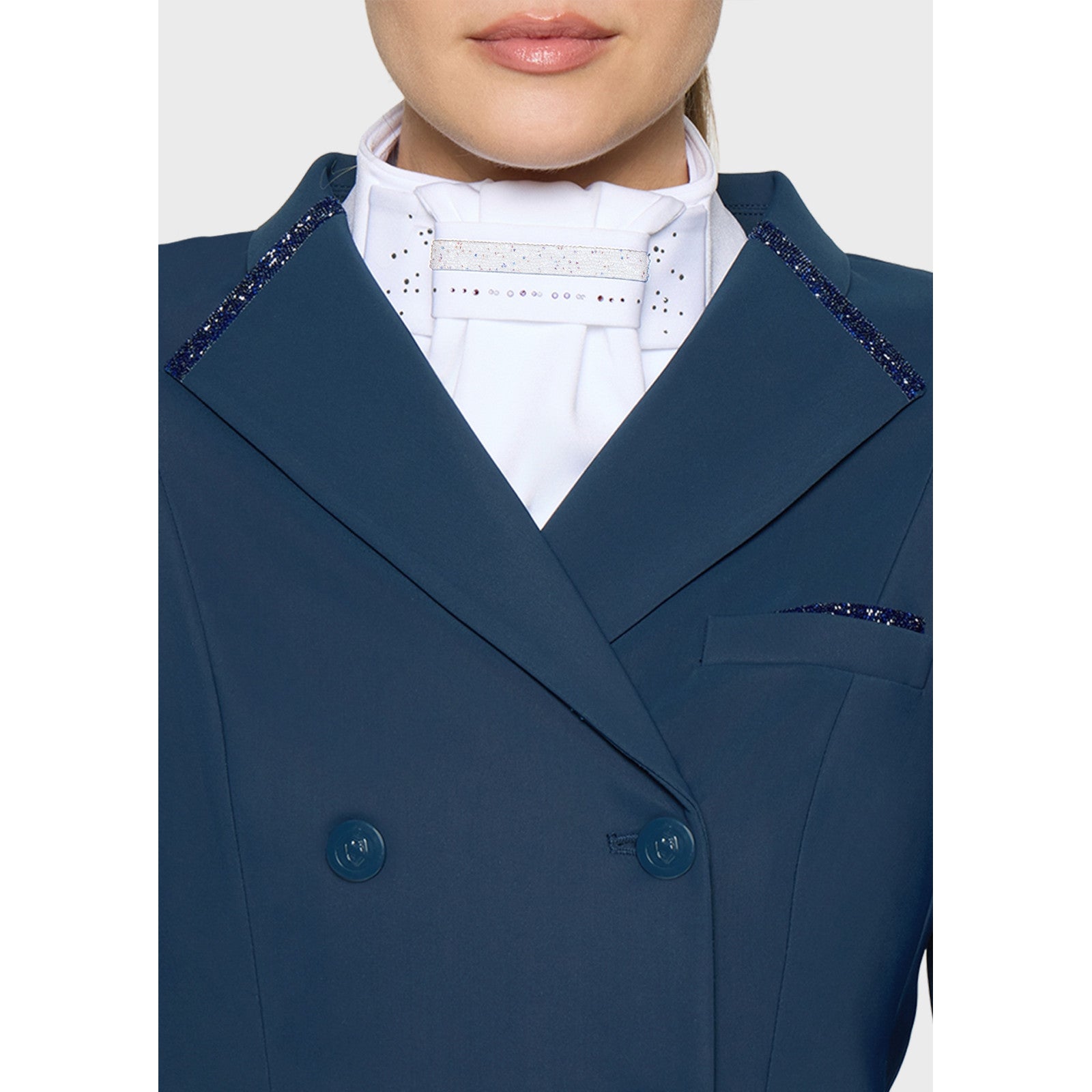 Front view of a model wearing the Holo Fall 2026 Samshield Plastron Premium Stock Tie under a Blue show coat