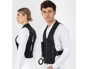 Views of both a female and male model wearing the Black Freejump Plume Airvest on a plain background