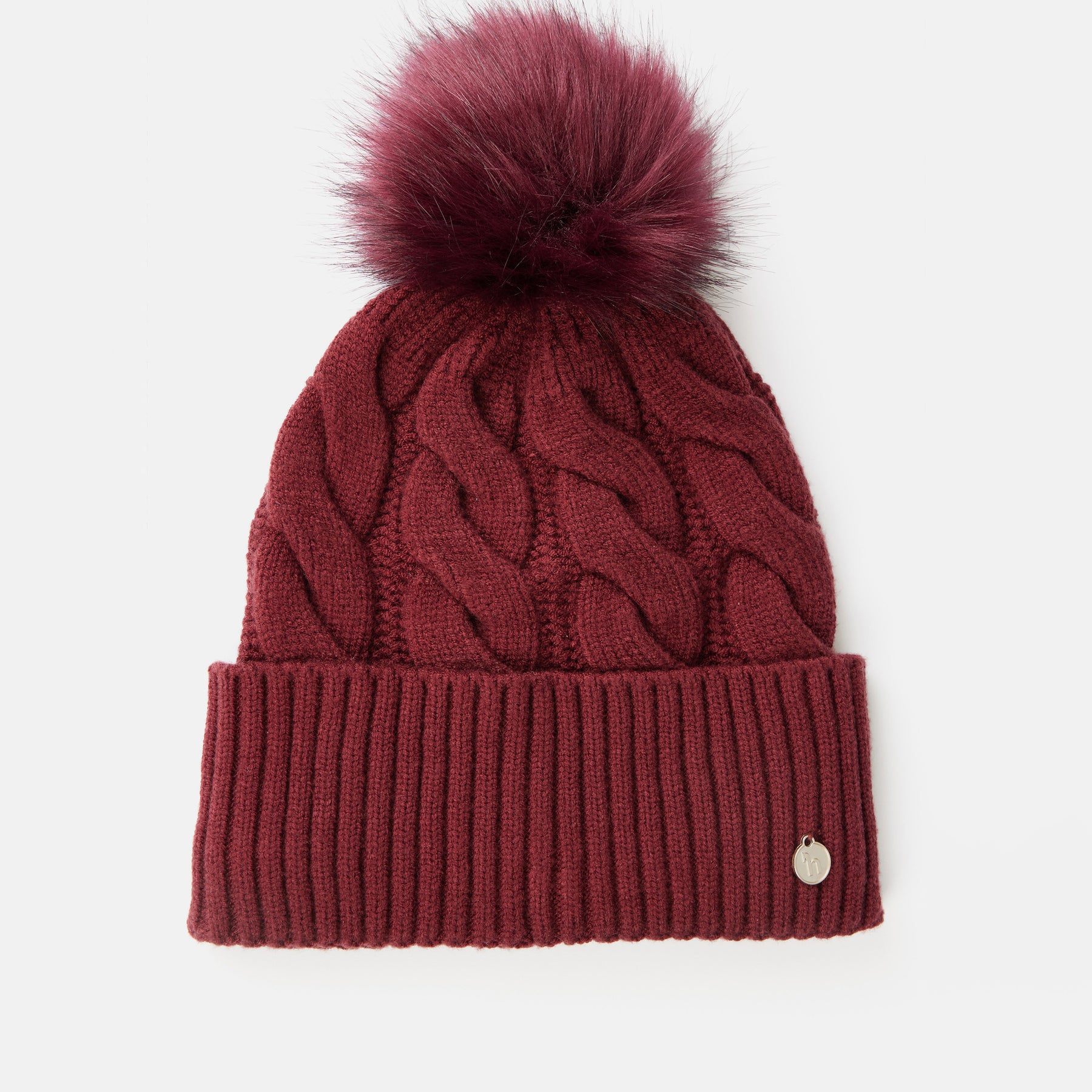 Front view of the Spiced Apple Horze Anni Knitted Hat on a white background