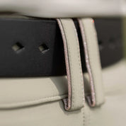 Angled back closeup view of a model wearing the the Equinavia Milli Diamonds Leather Belt showing the diamond-shaped notches