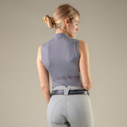 Back view of a female model wearing the Volcanic Glass Tredstep Ireland LA Sport Sleeveless Training Shirt on a plain background