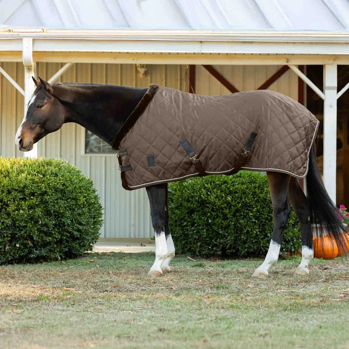 Brown fabric quilted stable blanket with faux fur neck lining shown on horse