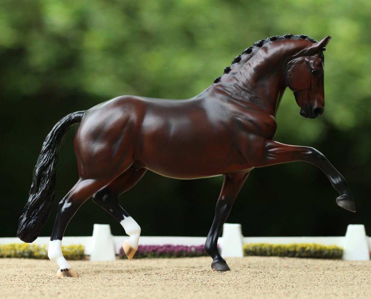 Side view of the Breyer Salvino Horse staged in an arena scene