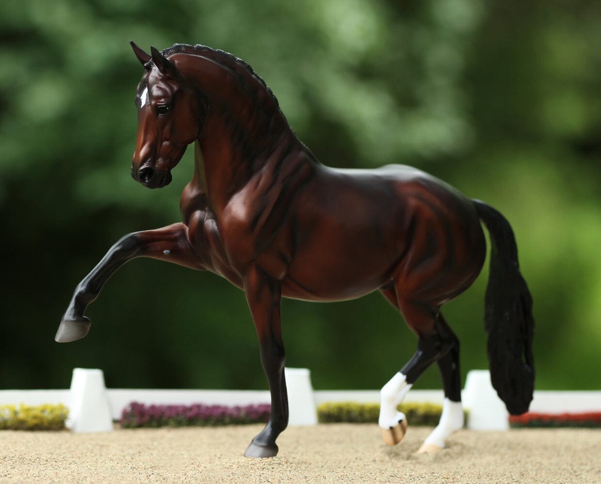 Side view of the Breyer Salvino Horse staged in an arena scene