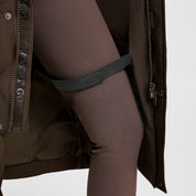 Close-up view of a leg strap on the Turkish Coffee B Vertigo Gem Waxed Padded Long Coat on a white background