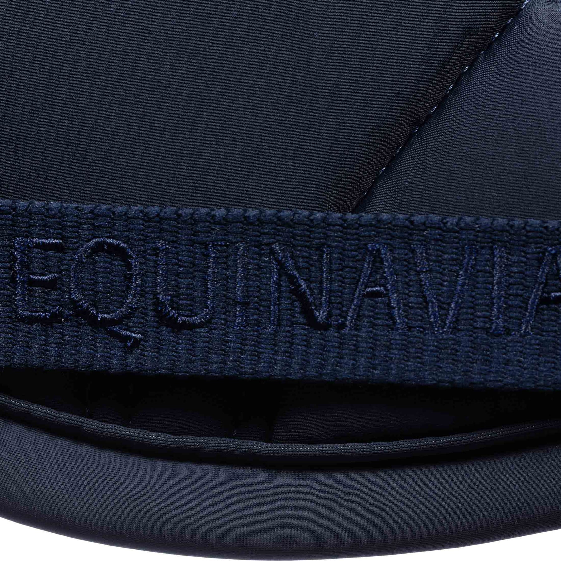 Close-up view of the girth keeper on the Navy Equinavia Bergen Crystal All Purpose Pad