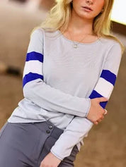 Light grey knit long sleeve sweater with stripes shown on model