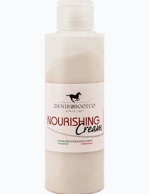 Cream bottle of boot cream with white label on plain white background