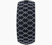 Black cylindrical container with white geometric pattern on a white background