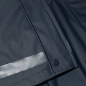 Closeup view of the Navy Horze Hazel Womens Long Raincoat on a plain background showing the reflective stripes