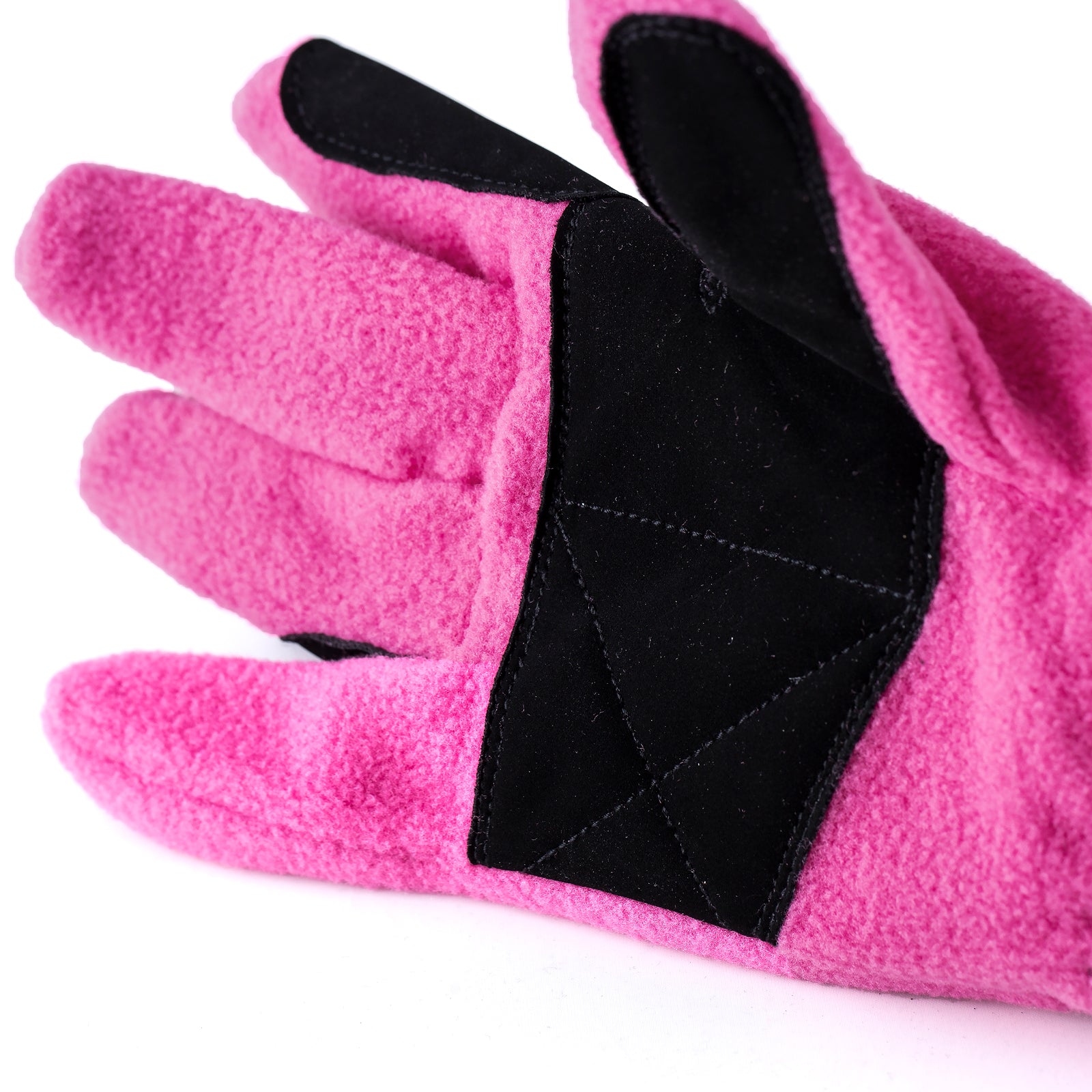 Close-up view of the palm grip on the Deep Coral Pink Horze Kids Fleece Gloves on a white background