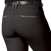 Back closeup view of a model wearing the Anthracite Equinavia Victoria Knee Patch Breeches on a plain background